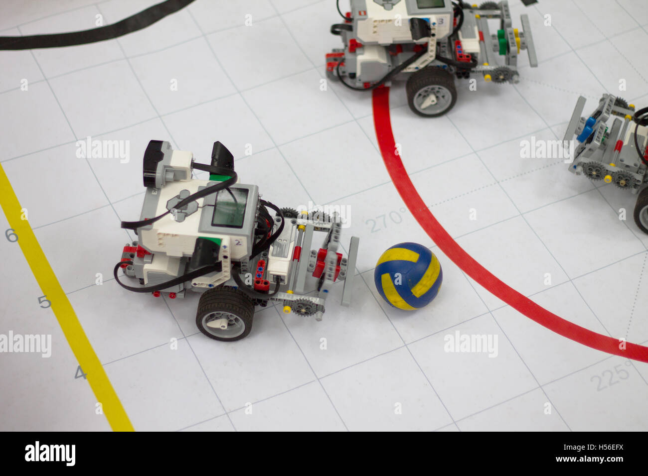 Automated machines and ball game of football Stock Photo - Alamy