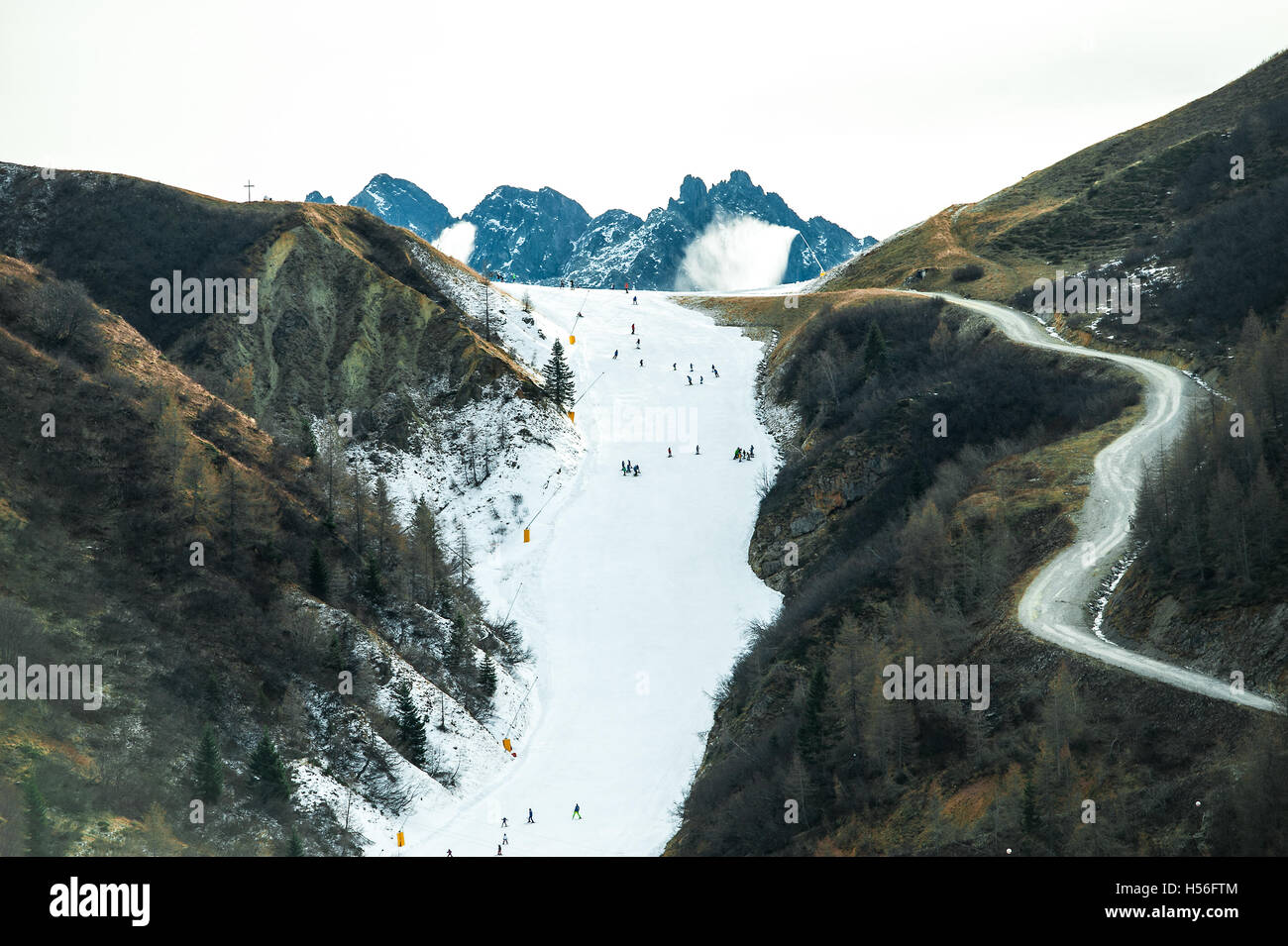 Ski slope with artificial snow beside all dry Stock Photo Alamy