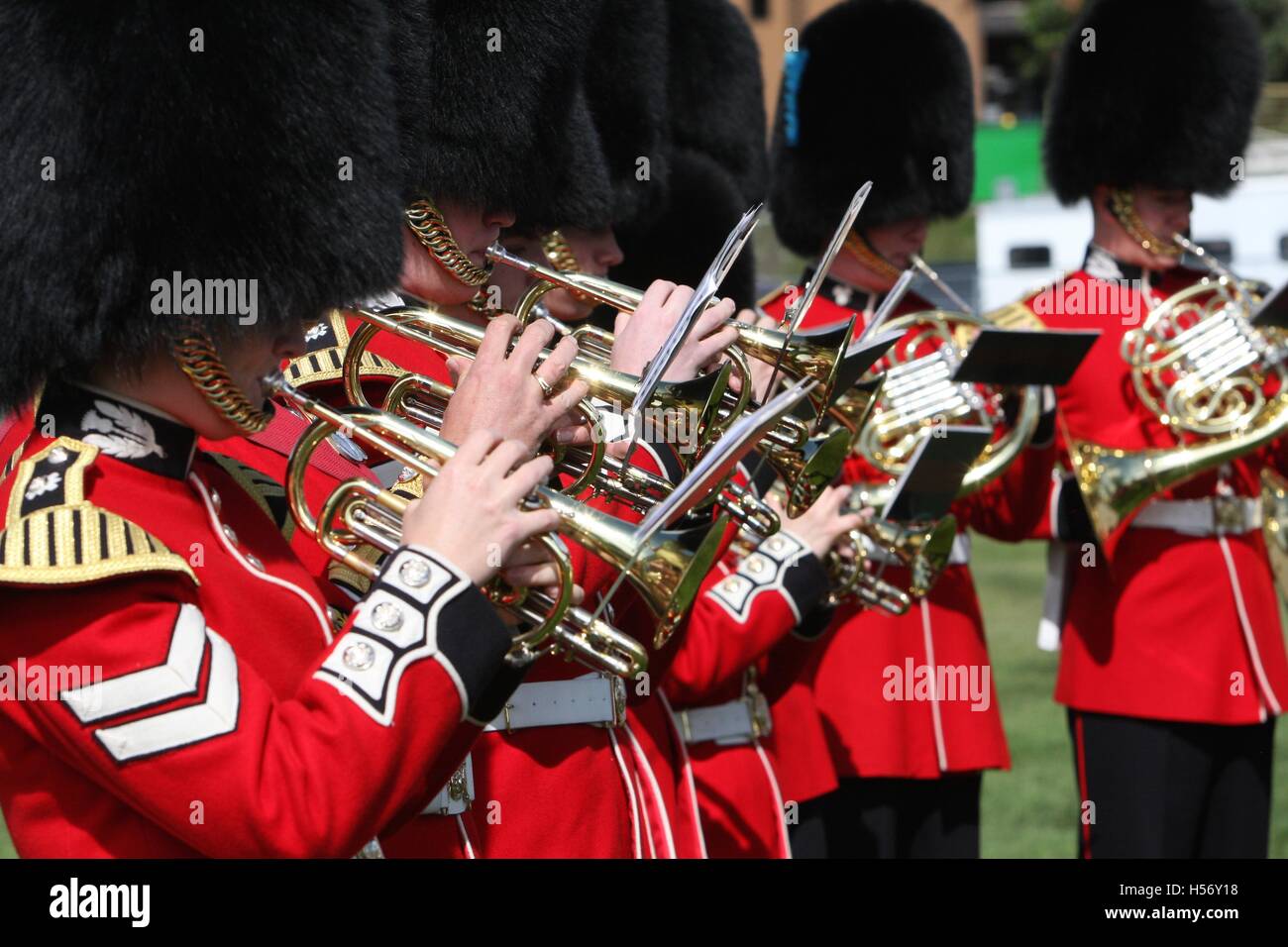 This marching band lines up in a semicircle to play the Canadian National anthem for the crowd