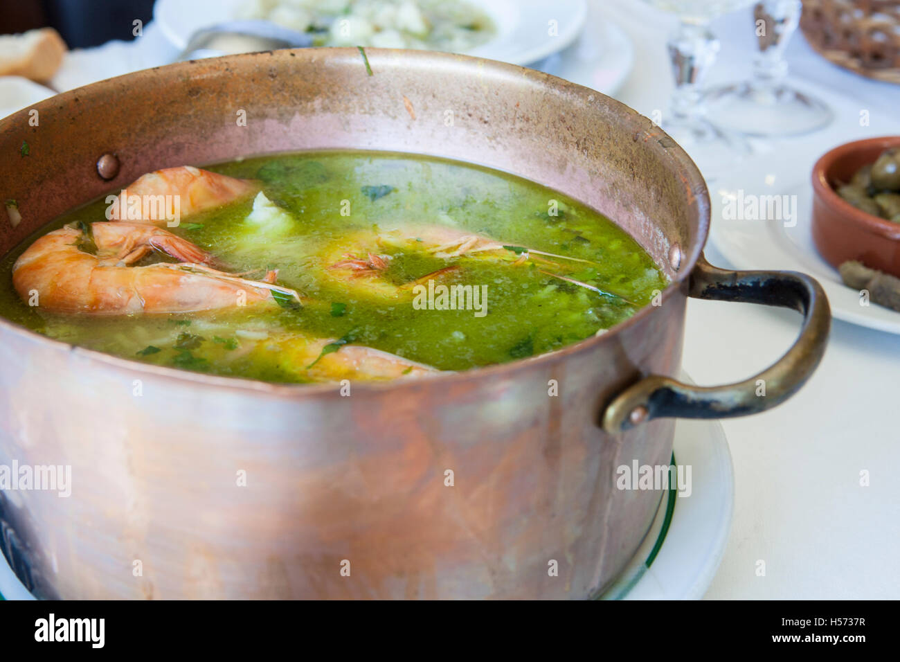 Arroz de Tamboril or soupy seafood rice, portuguese recipe Stock Photo