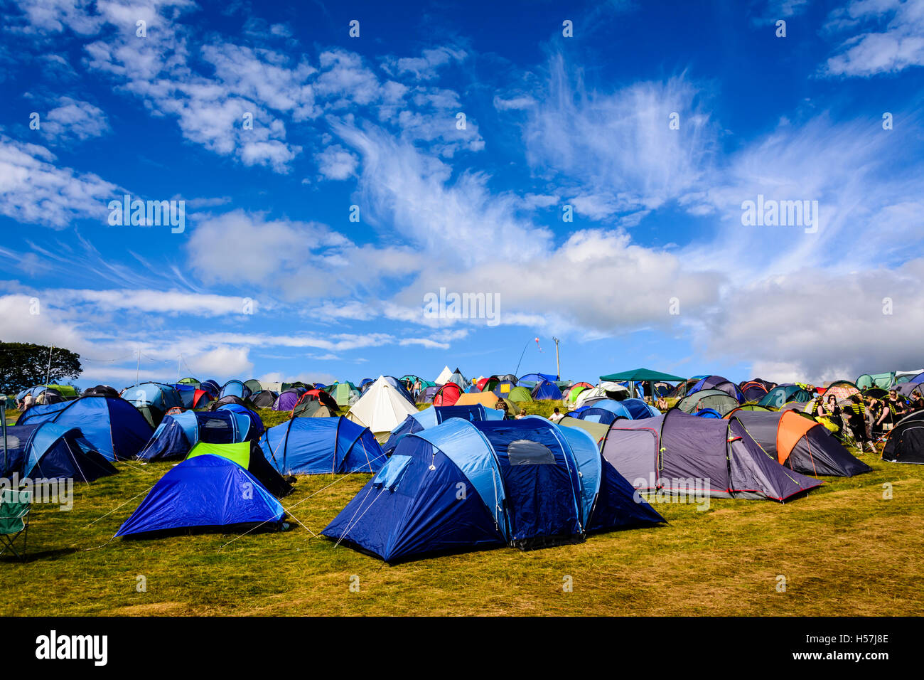 A collection of brightly coloured tents camping at Festival No.6, Portmeirion, Wales, UK Stock Photo