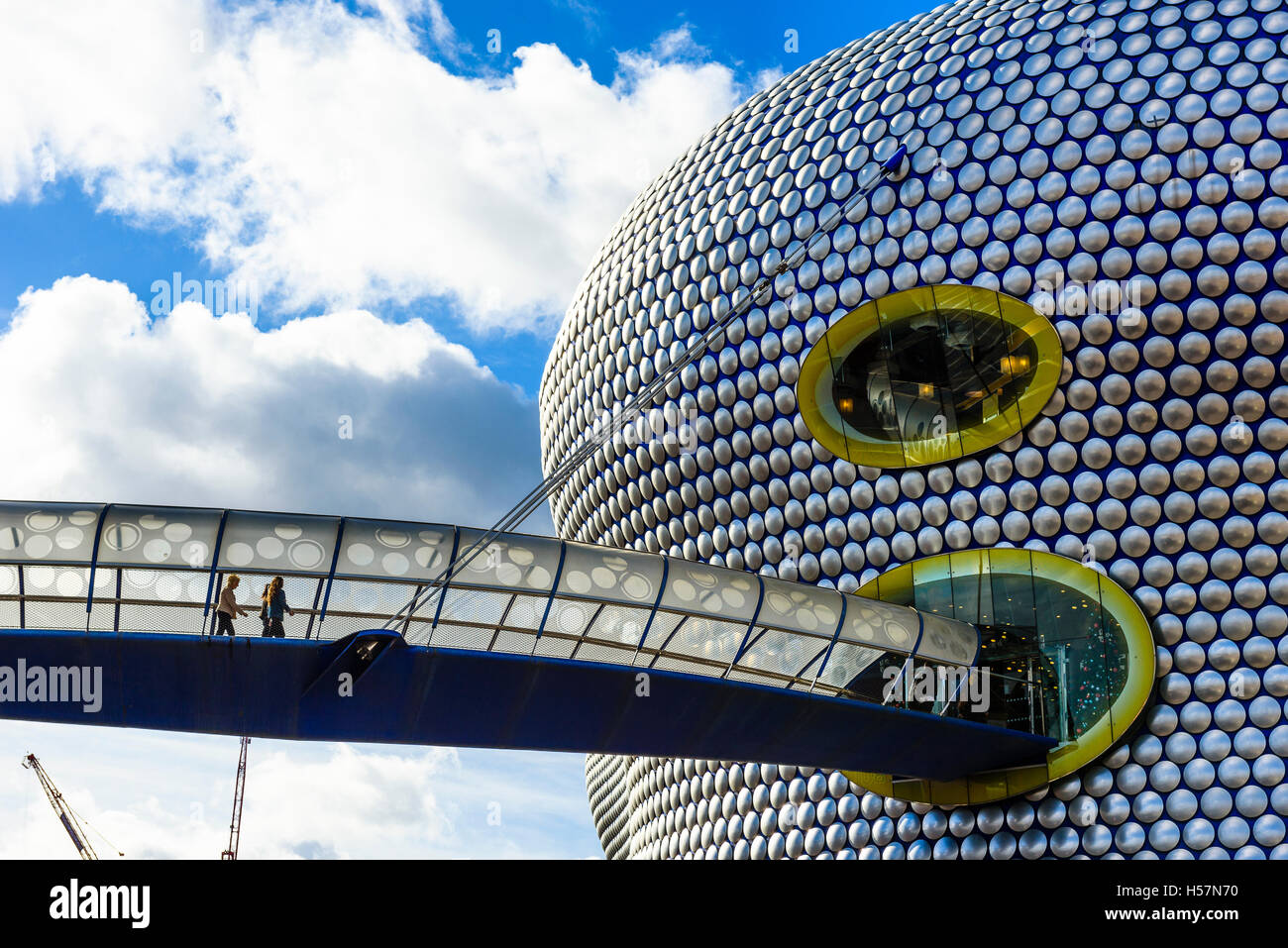 Pedestrians on footbridge linking to the iconic Selfridges store in ...
