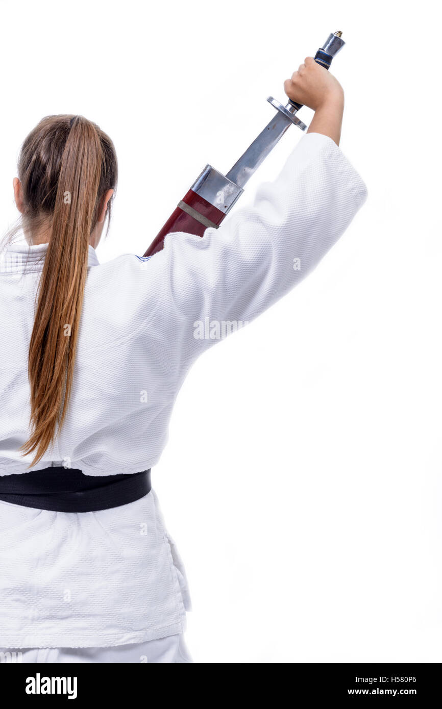 Young athlete hand, martial arts, hold a sword Stock Photo Alamy