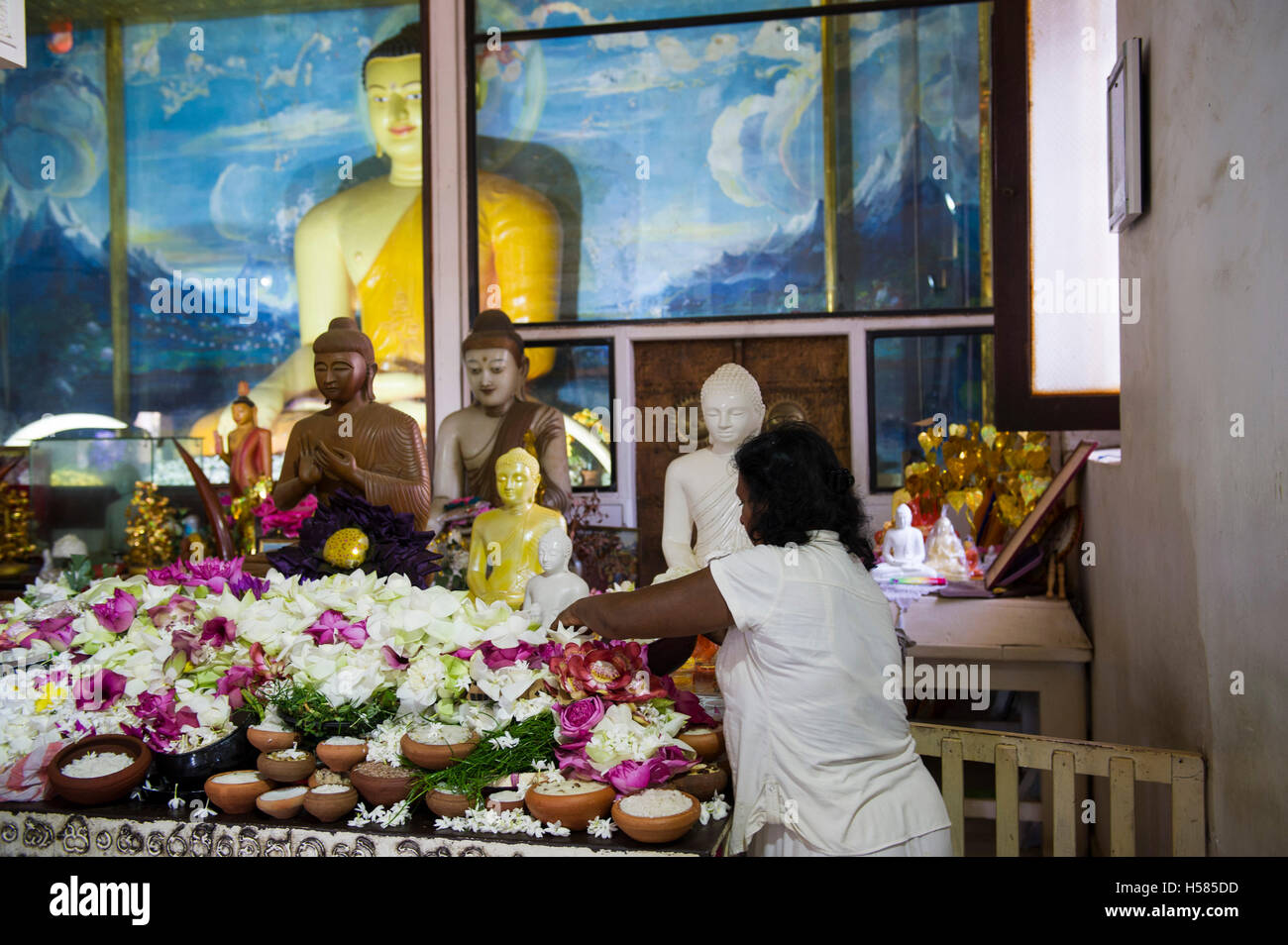 Buddha statue at the site of the Bodhi Tree planted in 249 BC, Jaya Sri Maha Bodhi, Mahamewna Gardens, Anuradhapura, Sri Lanka Stock Photo