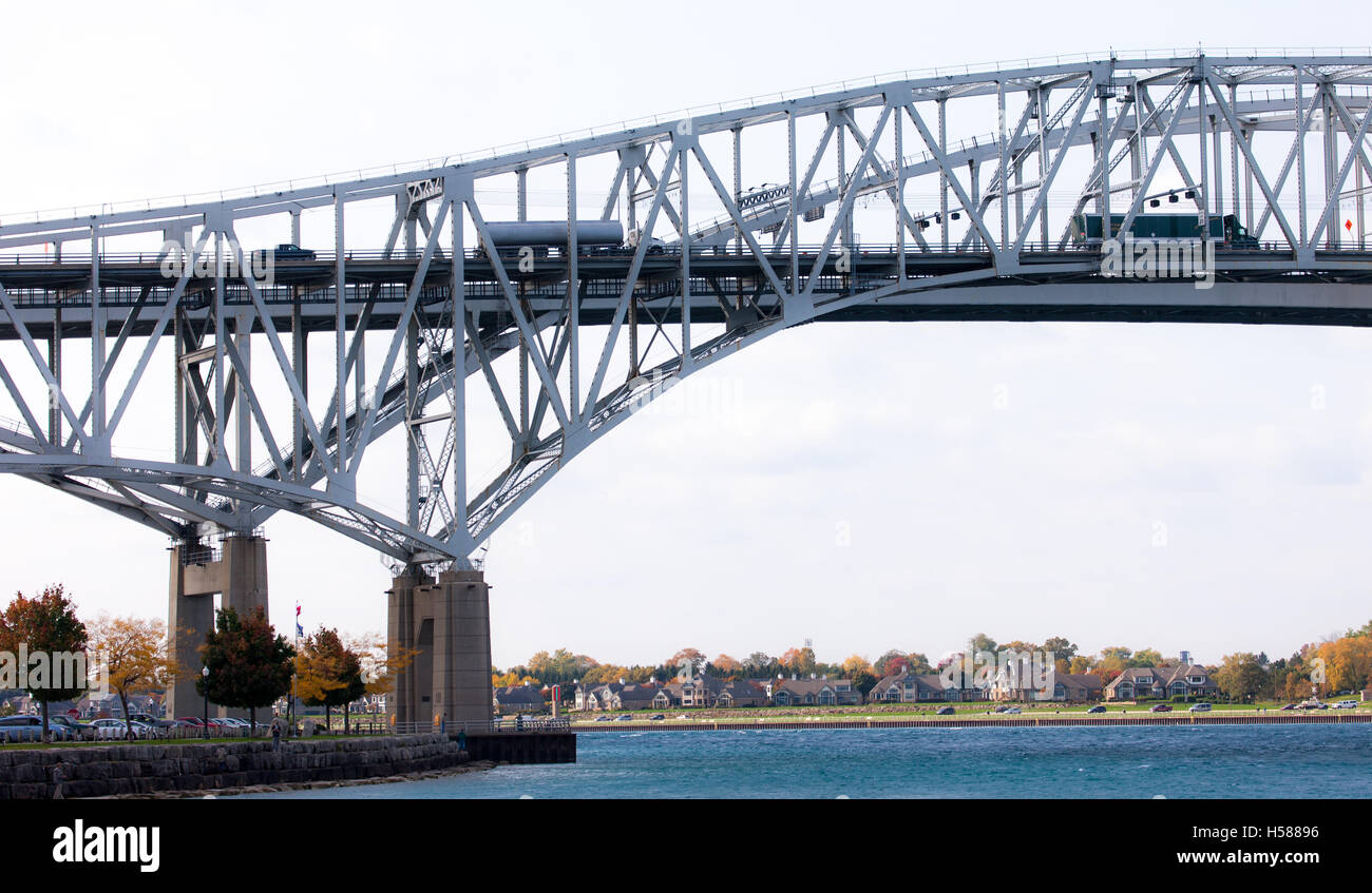 The Bluewater Bridge spanning the St. Clair River connects Sarnia Ontario, Canada, to Port Huron Michigan, USA. Stock Photo