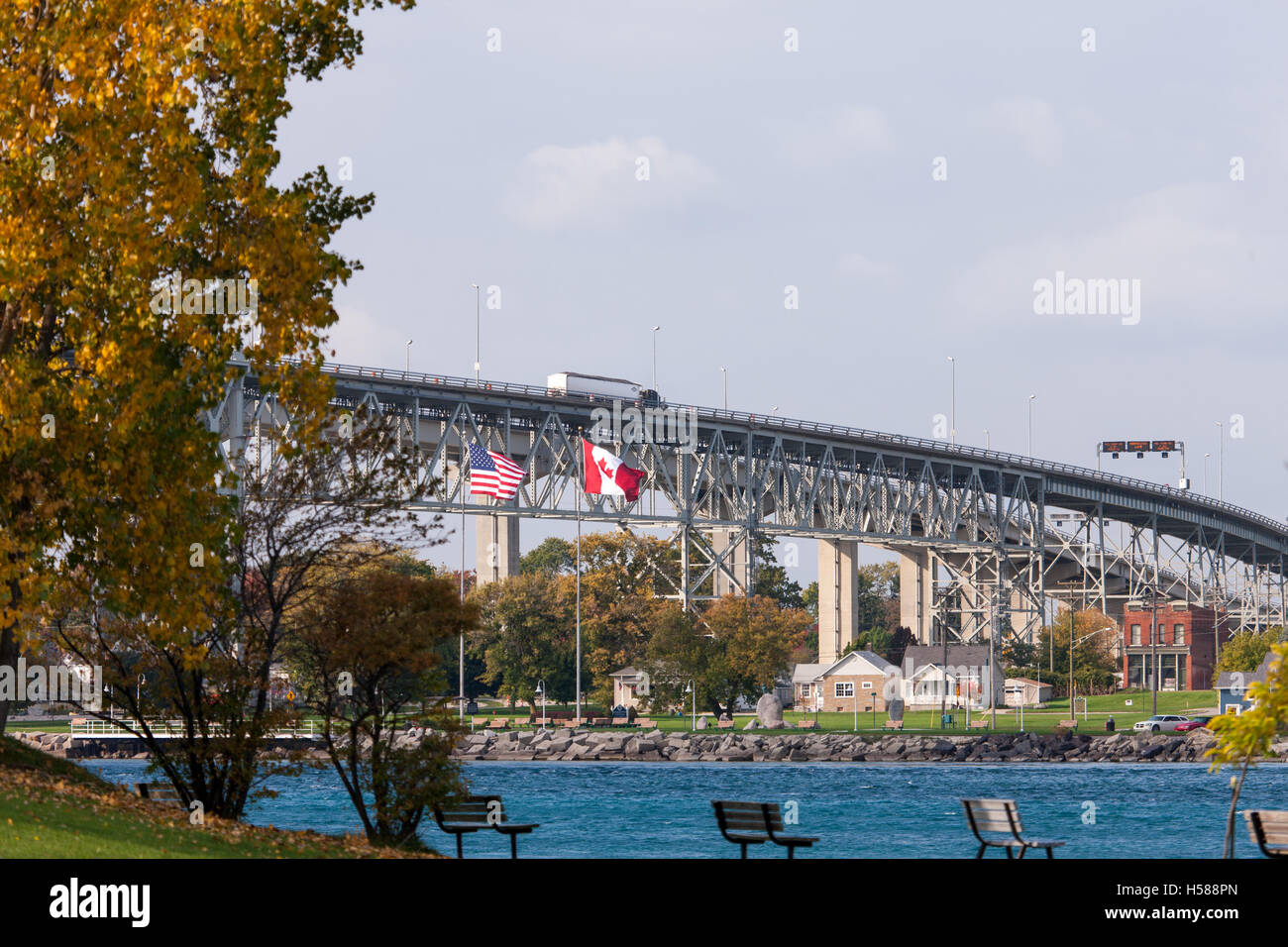 The Bluewater Bridge spanning the St. Clair River connects Sarnia Ontario, Canada, to Port Huron Michigan, USA. Stock Photo