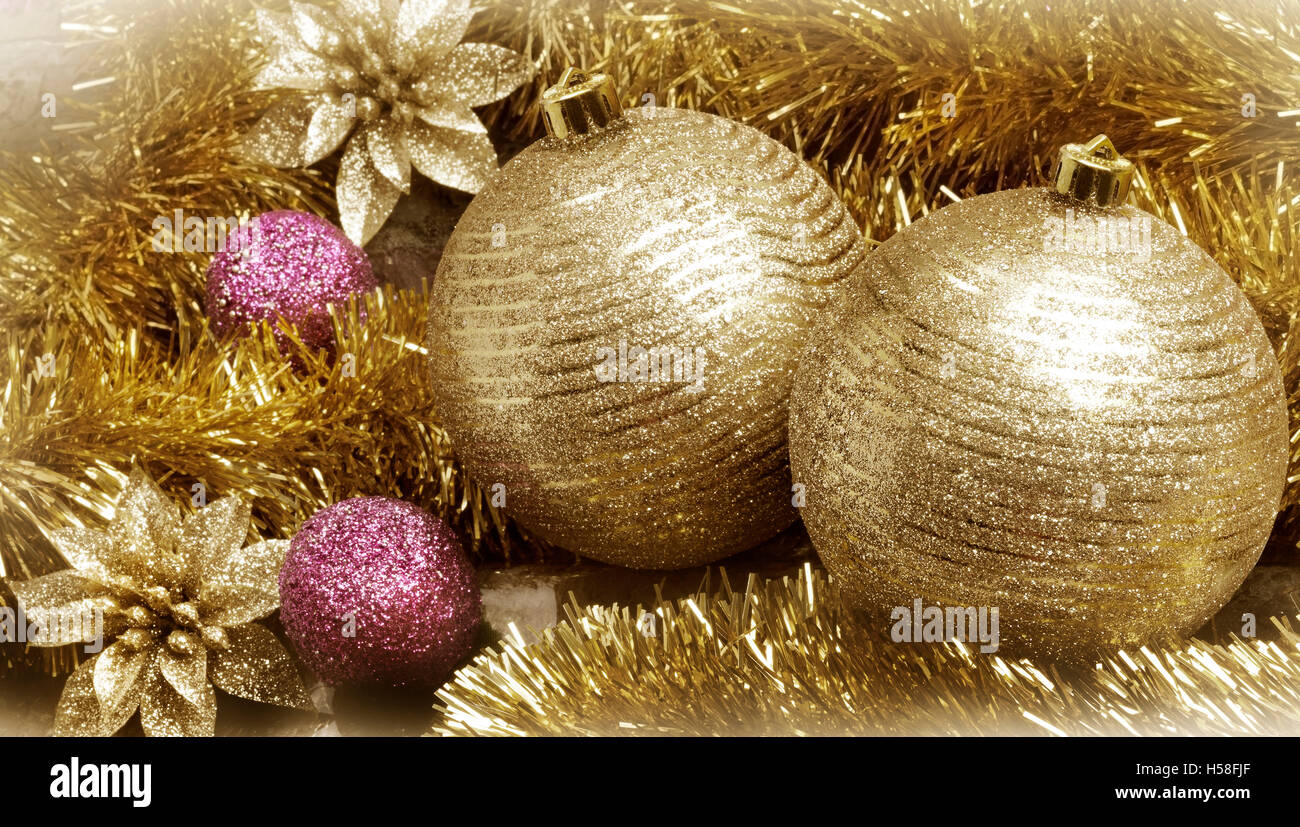 Golden Christmas decoration. Close Up view of golden Christmas balls and wreaths  set. Stock Photo