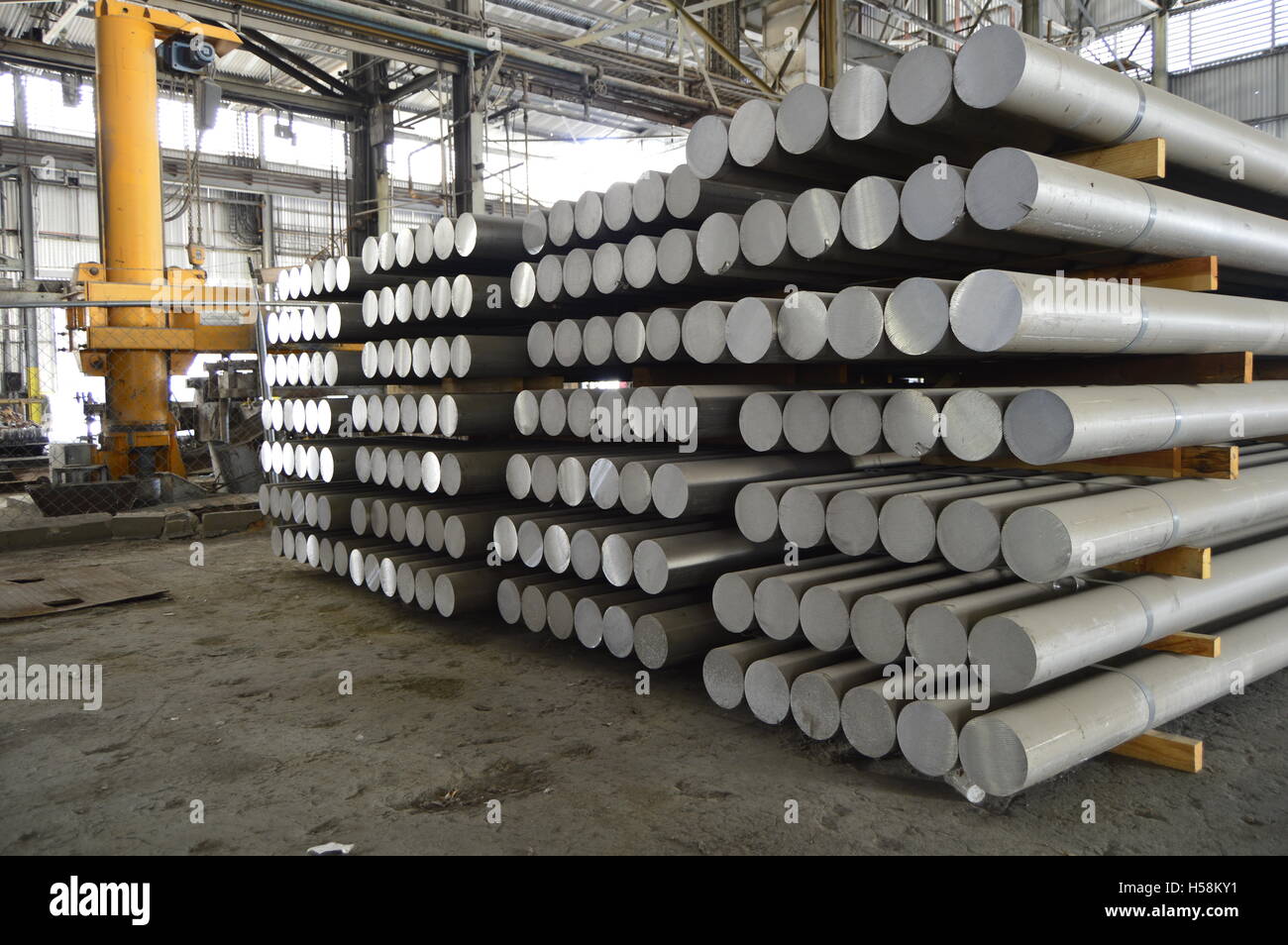 Primary aluminum metal cylinders employed in the extrusion process. Stock Photo
