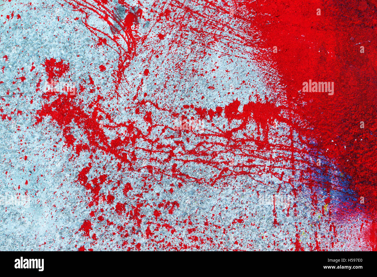 Red blood paint splatter, splash and spray on exterior wall, urban background Stock Photo