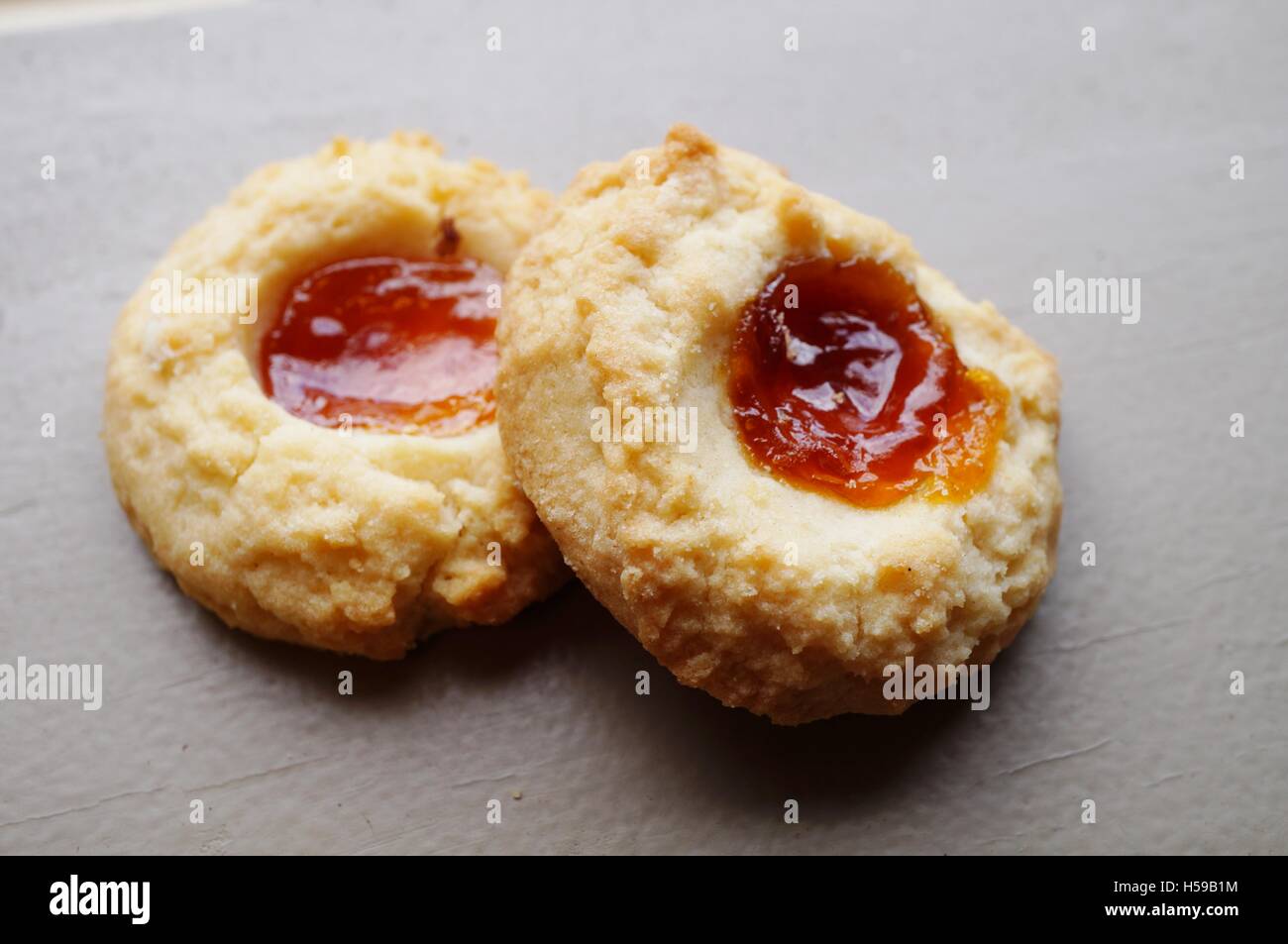 Homemade apricot jam thumbprint cookies Stock Photo Alamy