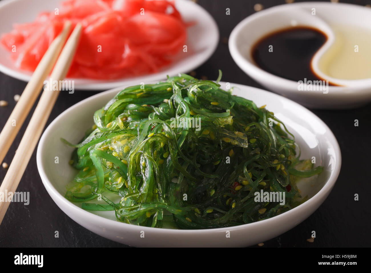Chuka salad and pickled ginger close-up on the table. Horizontal Stock Photo