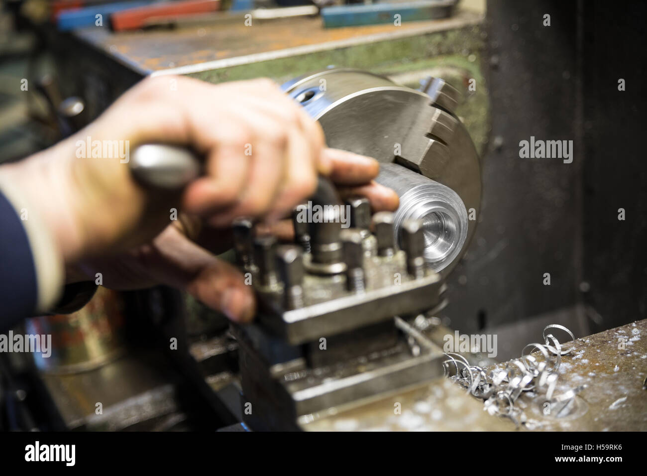 Metalworking industry, metal working on lathe grinder machine Stock Photo Alamy