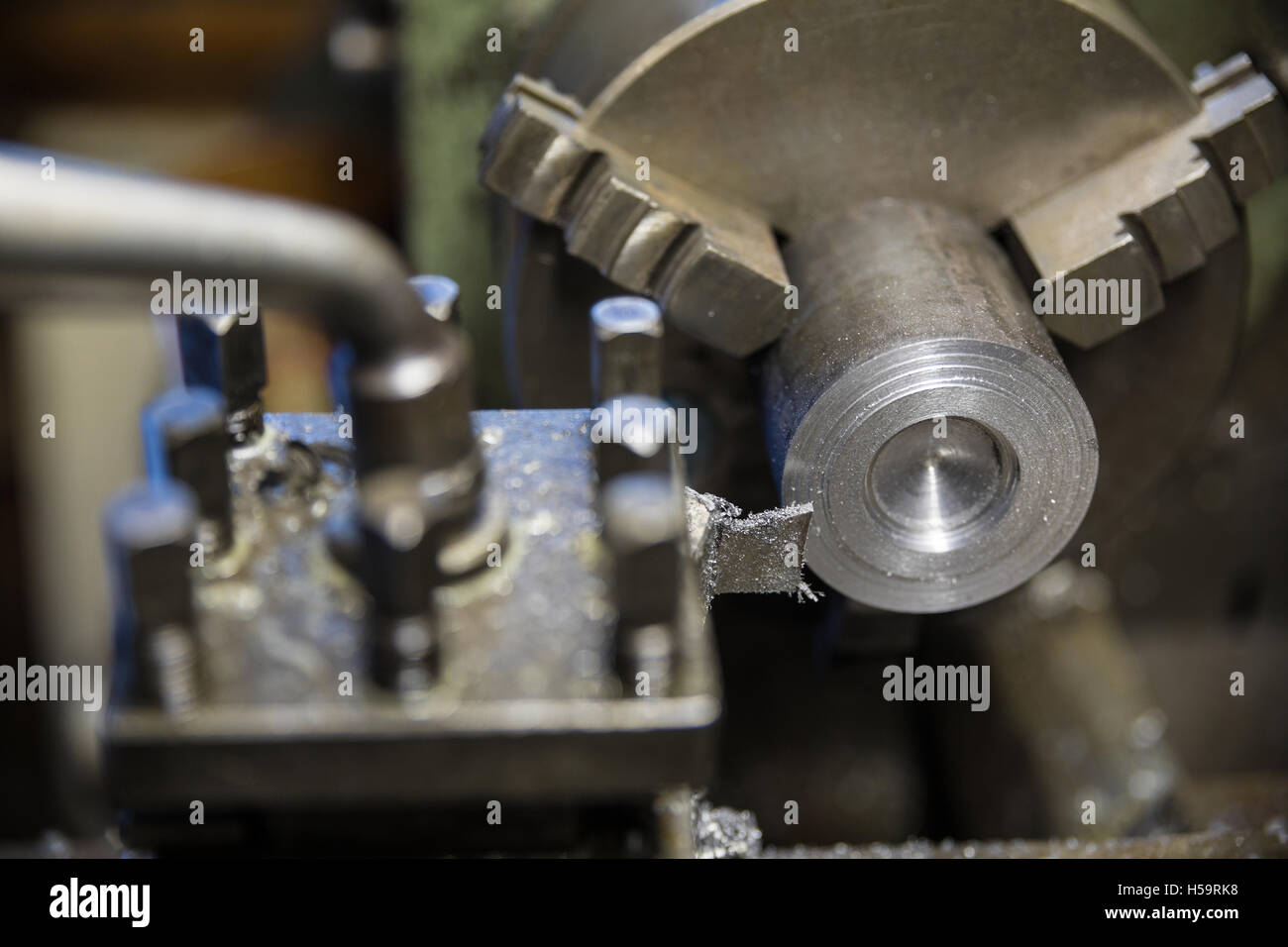 Metalworking industry, metal working on lathe grinder machine Stock Photo Alamy