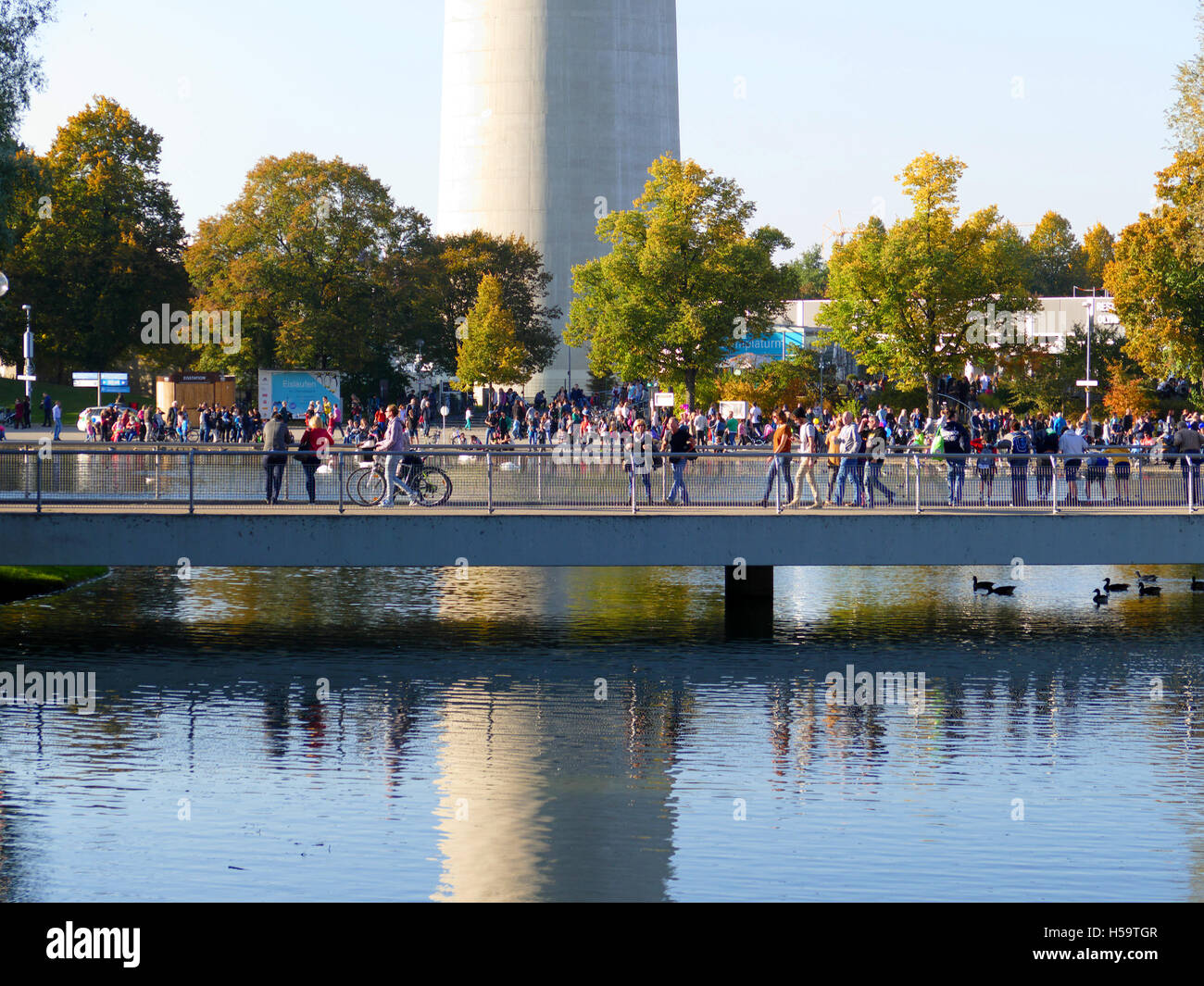 Munich Olympia Park TV Tower people enjoy in sunny day Germany Europe Stock Photo