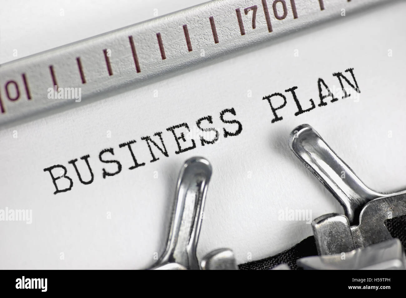 Typewriter detailed macro closeup typing text Business Plan, large