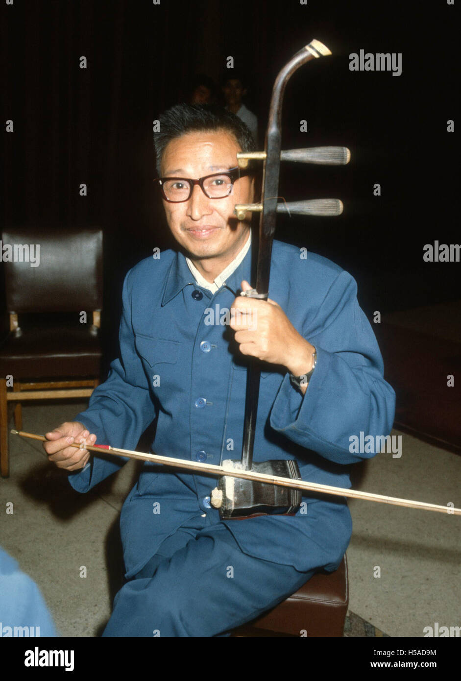Chines musician plays a ERHU  ancient Chinese stringed Stock Photo