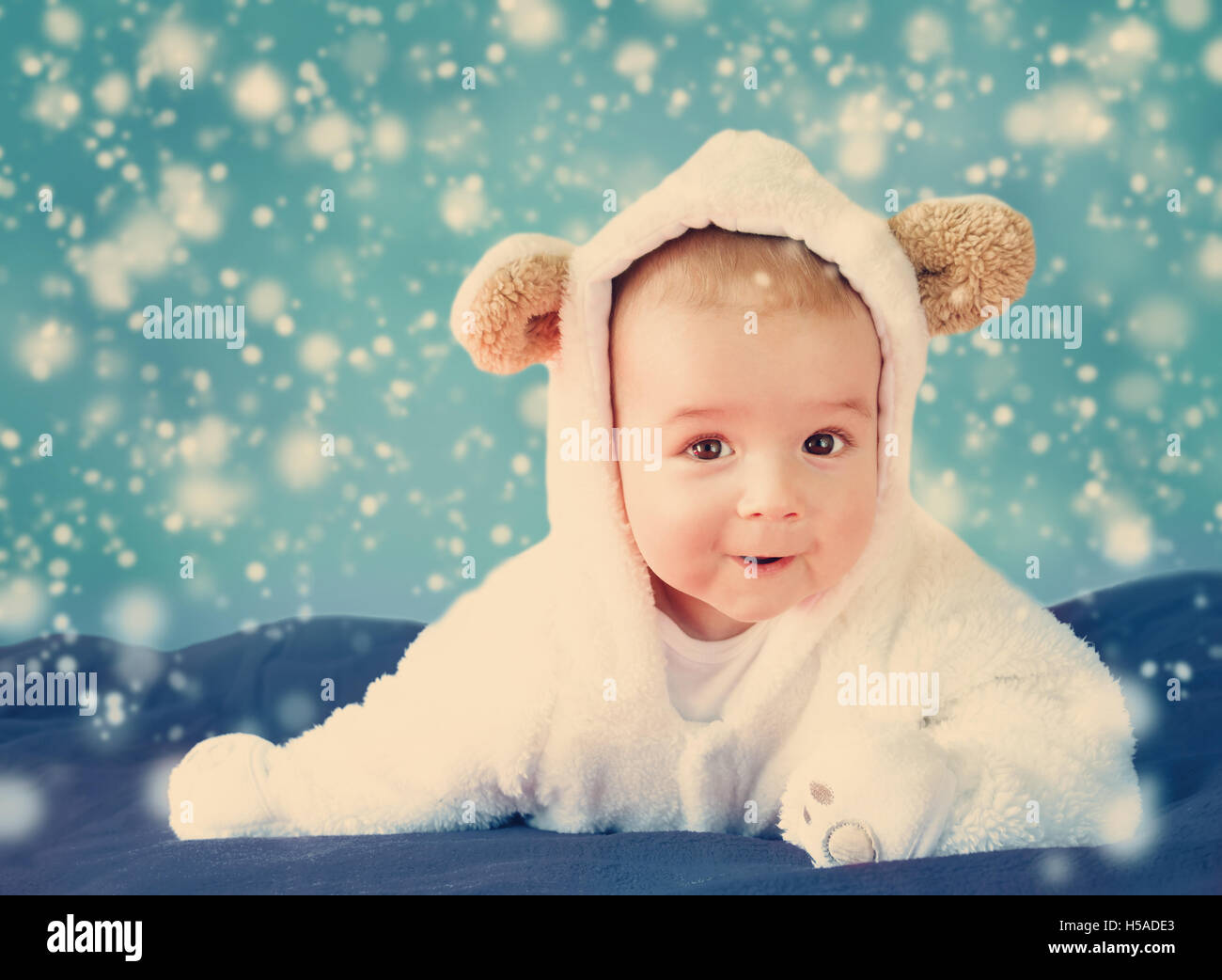 Baby in white bear costume Stock Photo Alamy