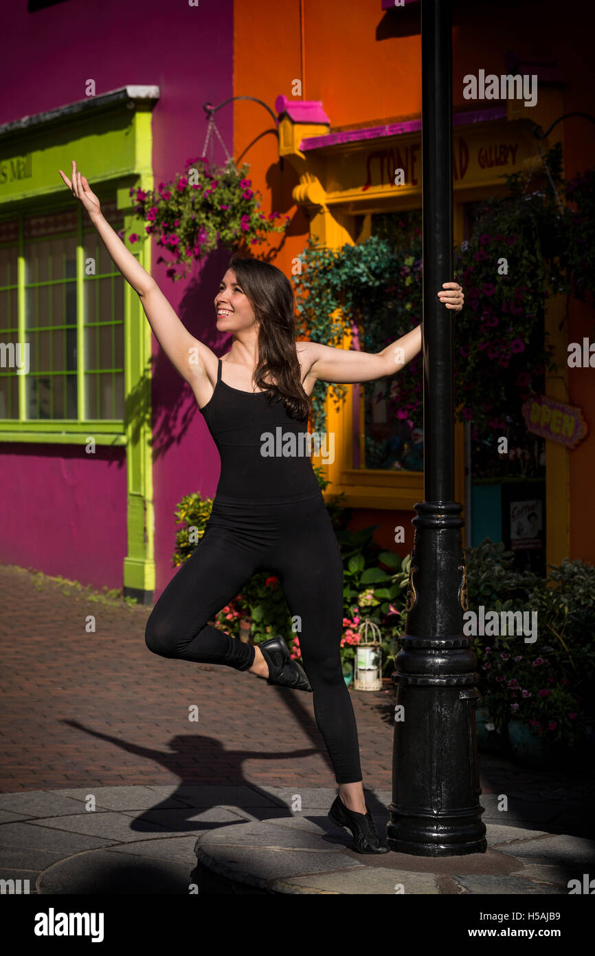 Alesha dancing in the streets of Kinsale, County Cork, Ireland Stock Photo