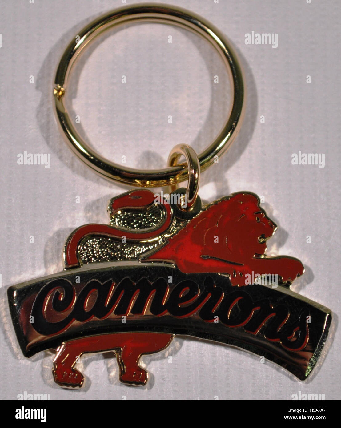 A key ring featuring branding from Camerons Brewery, likely used as promotional merchandise. Camerons Brewery is a UK-based brewery known for producing traditional beers and ales. Stock Photo