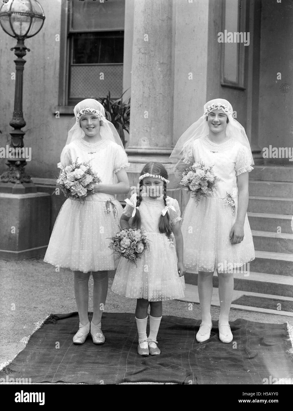 Smiliest flower girls ever¿ Stock Photo Alamy