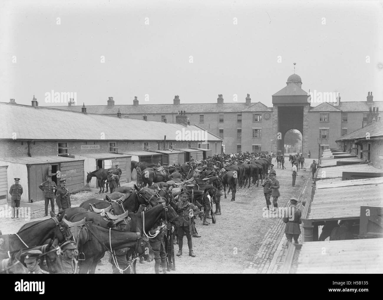 Troop stables refer to the facilities used for housing and caring for military horses and cavalry units. These stables were essential in supporting military operations during historical conflicts. Stock Photo