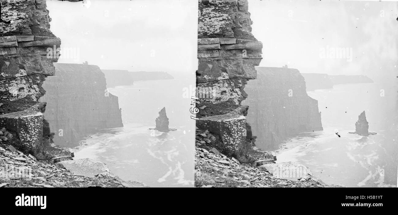 The Cliffs of Moher are a famous natural landmark in County Clare, Ireland, known for their dramatic views over the Atlantic Ocean. Stock Photo