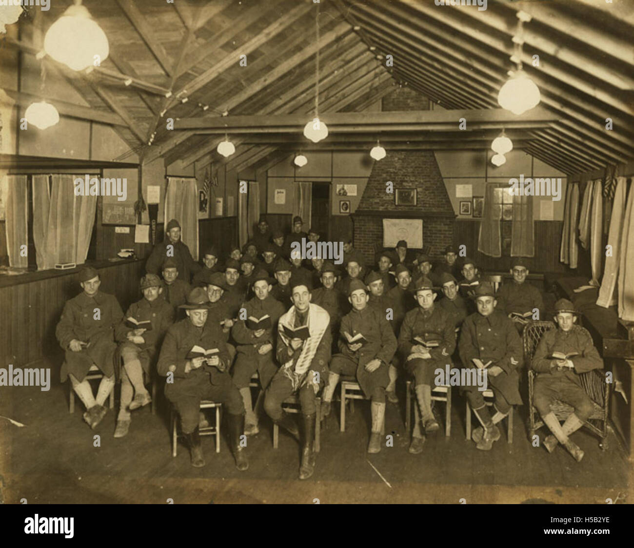Chaplain presiding over religious service with soldiers at Camp Raritan, circa 1920 Stock Photo