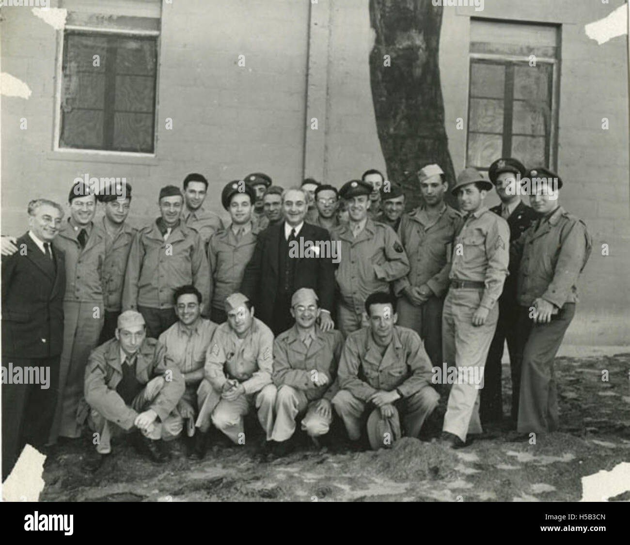 Chaplain Aryeh Lev and Doctor Barnett Brickner with soldiers at Levant Service Command Stock Photo