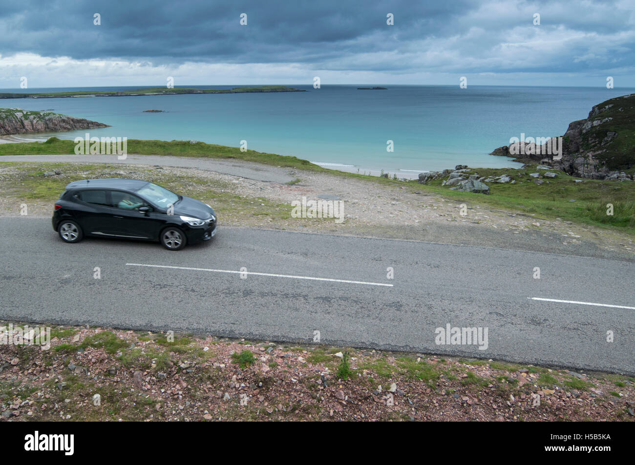 Car driving on the North Coast 500 scenic route near Durness in