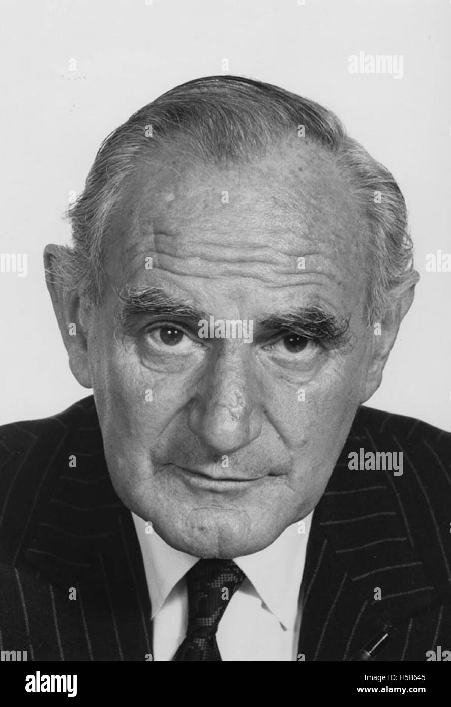 A portrait of Sir Huw Wheldon, a prominent figure from around 1980. He was known for his role in British broadcasting and his contribution to the BBC. His influence in television and media during this era remains notable. Stock Photo