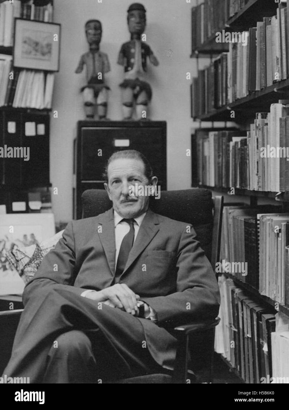 A portrait of Professor Sir Raymond Firth, an influential British anthropologist, photographed around 1965. Firth is known for his contributions to social anthropology and ethnographic research. Stock Photo