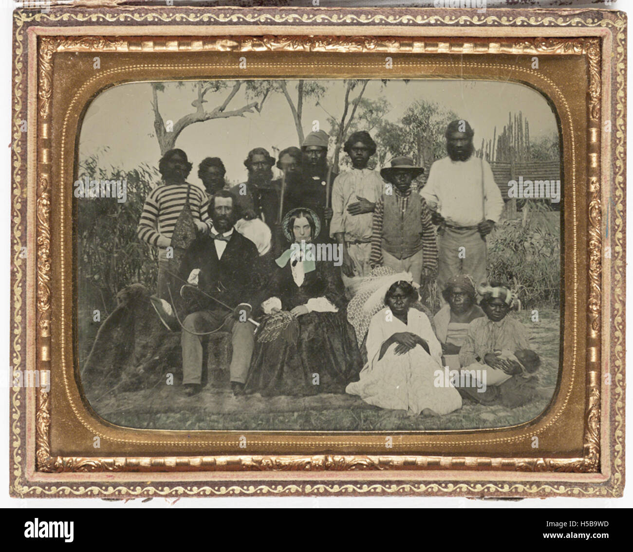 Plantation owner with his wife and servants Stock Photo Alamy