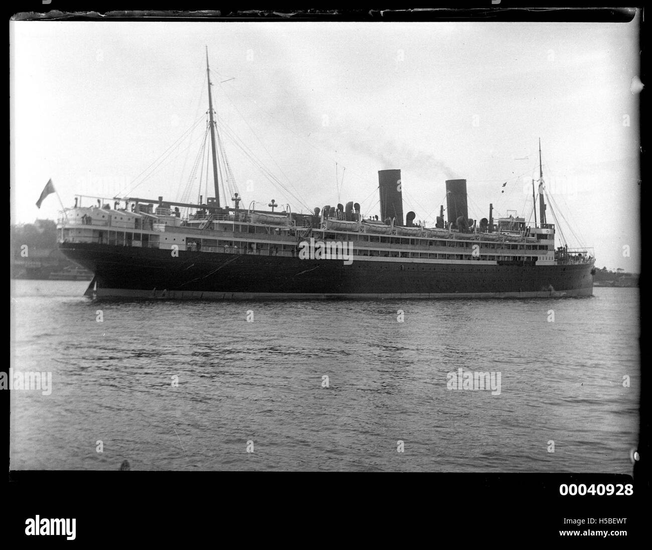 The RMS Niagara departs from Sydney, heading towards Vancouver. This historical image captures the ship as it embarks on its journey, likely in the early to mid 20th century. Stock Photo