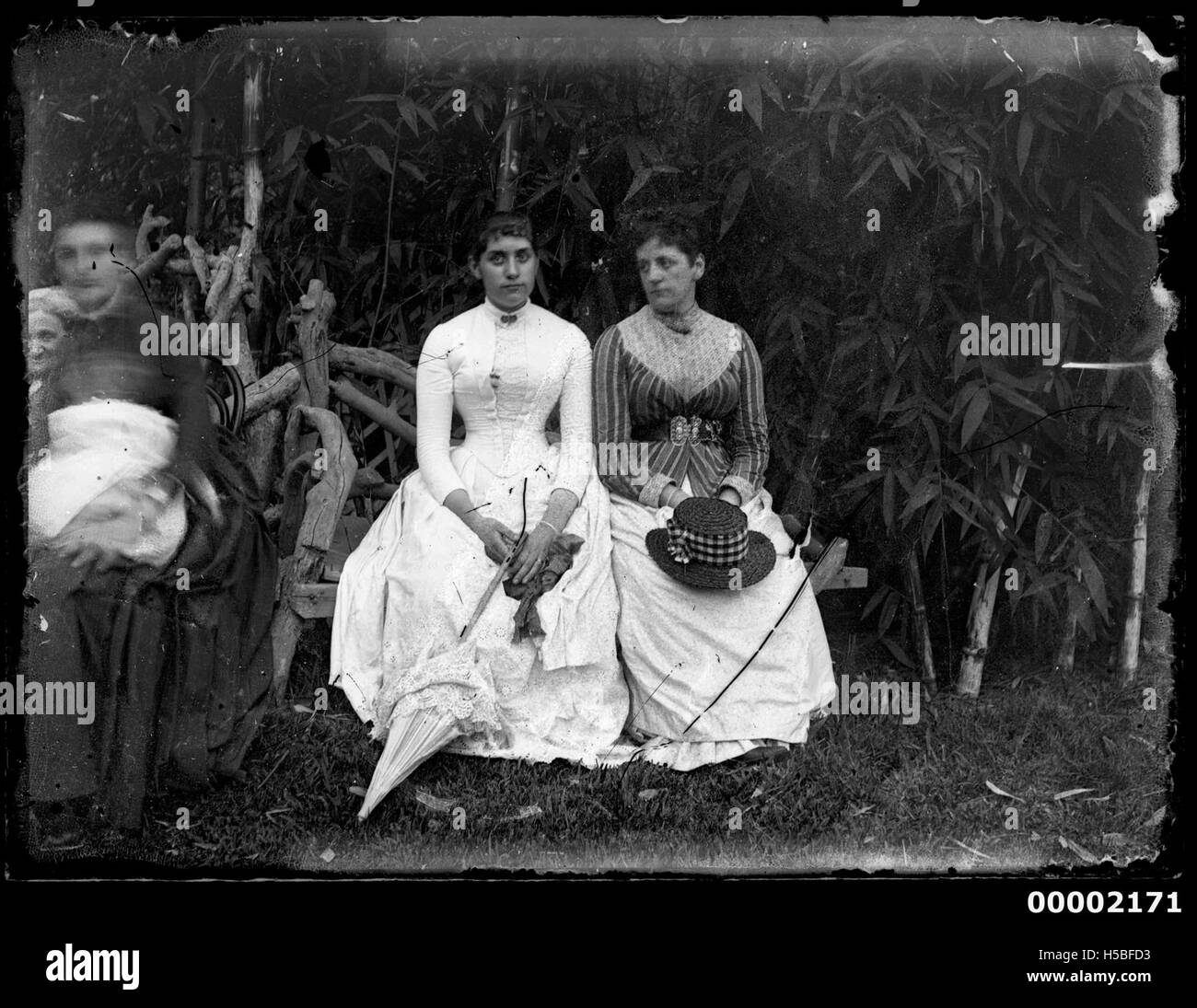 Portrait of two women seated Stock Photo - Alamy