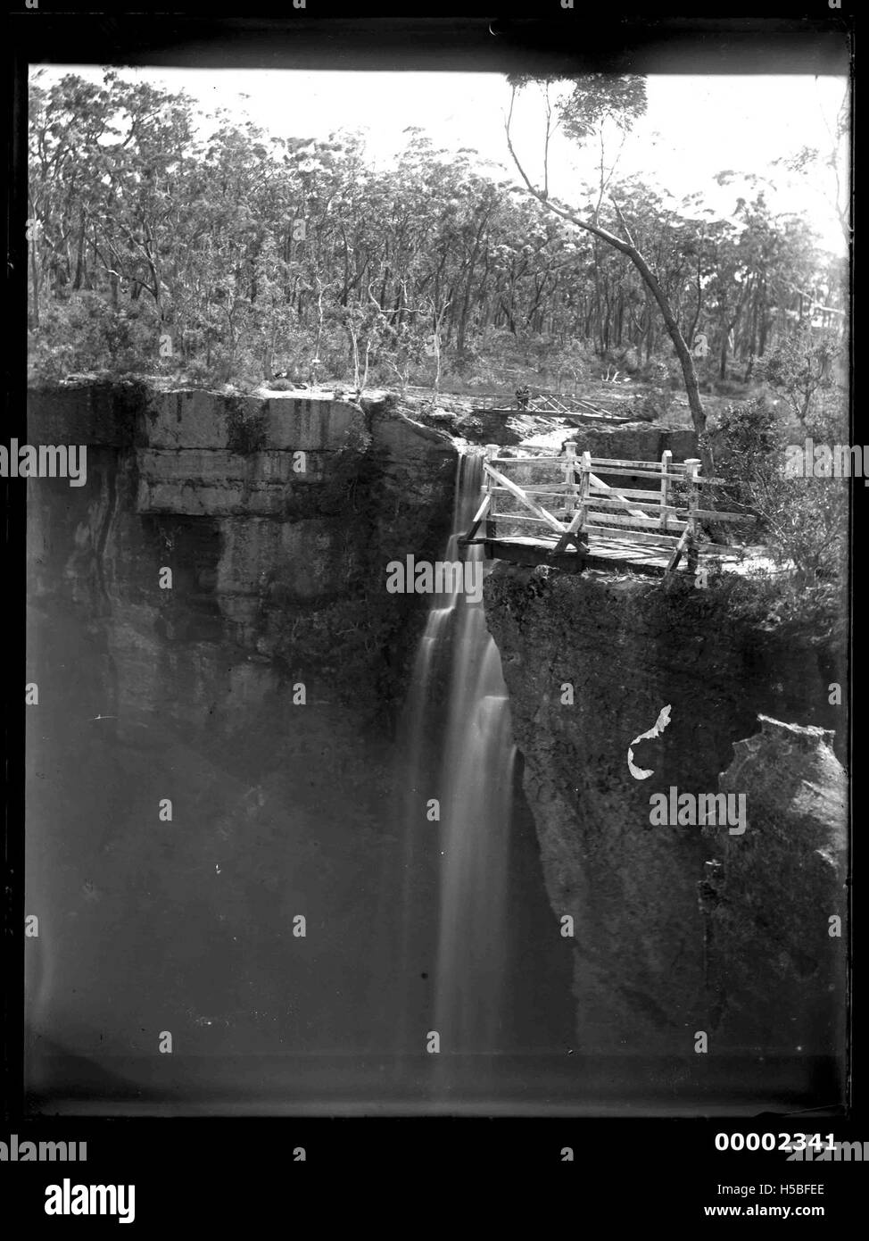 This image likely depicts a waterfall near the Hawkesbury River in New South Wales, taken between 1880 and 1909. The scene captures the natural beauty of the region, with a focus on the river’s landscapes and water features during this period. Stock Photo