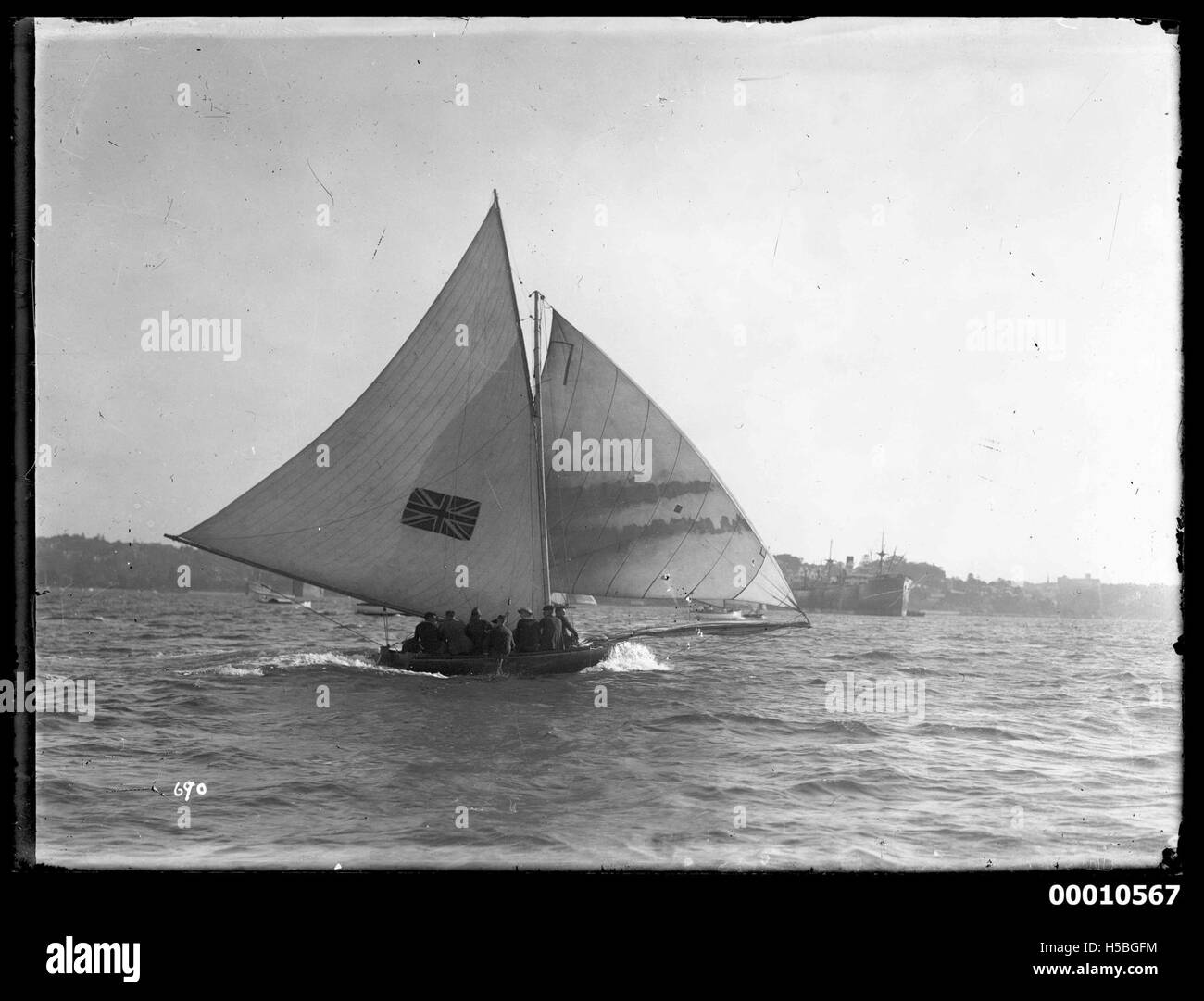 18 footer, possibly AUSTRALIA, under sail on Sydney Harbour Stock Photo