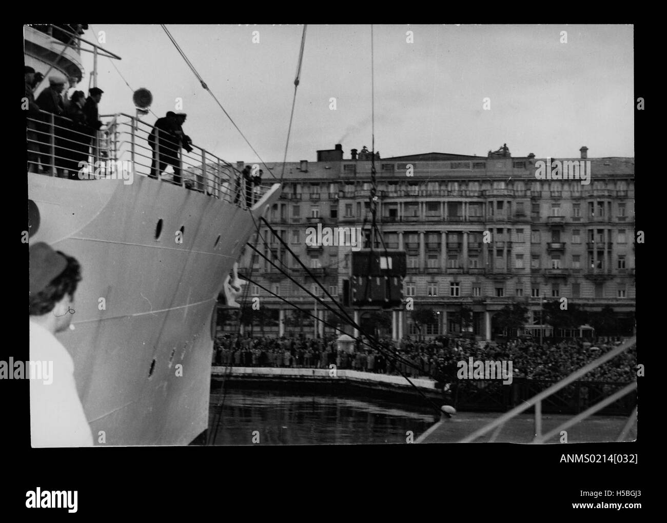 The CASTEL VERDE, a passenger ship, is seen at Trieste, Italy, in the early 1950s as migrants load household goods before embarking on a journey to Australia. This was part of the post-WWII migration period when many Europeans relocated to Australia for new opportunities. Stock Photo