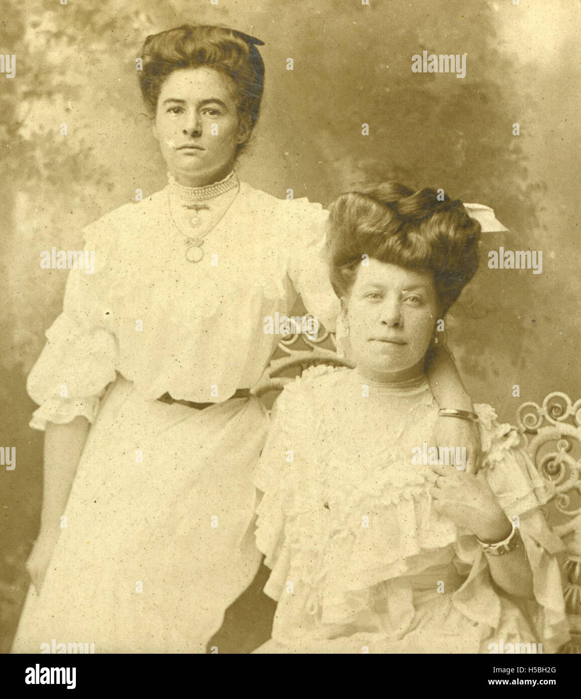 A photograph featuring Beatrice Kerr (left) alongside an unidentified ...