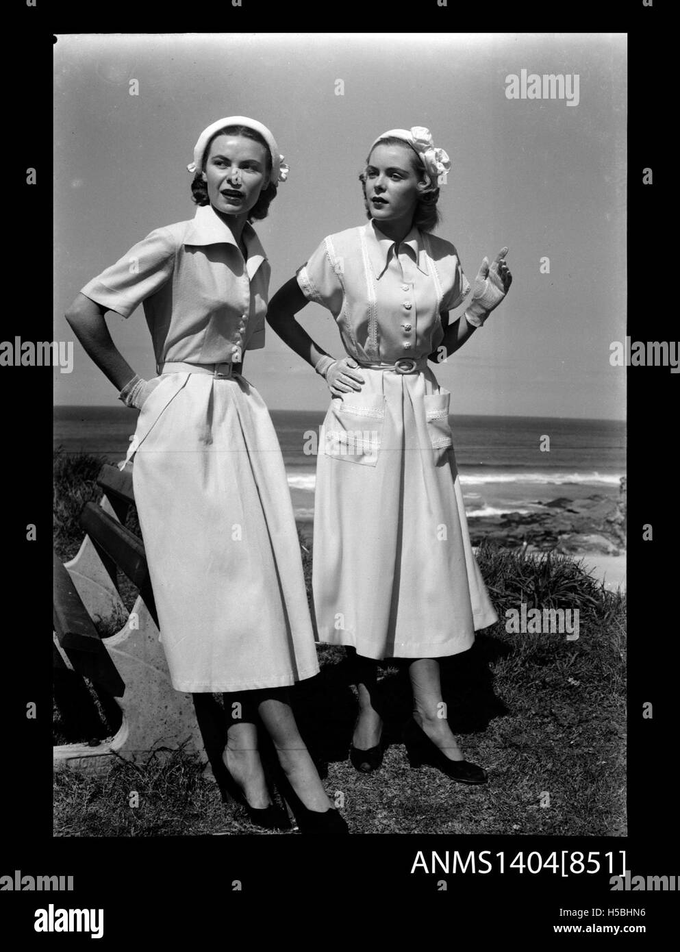 6 Two models posing near a beach, 1946-1962 Stock Photo