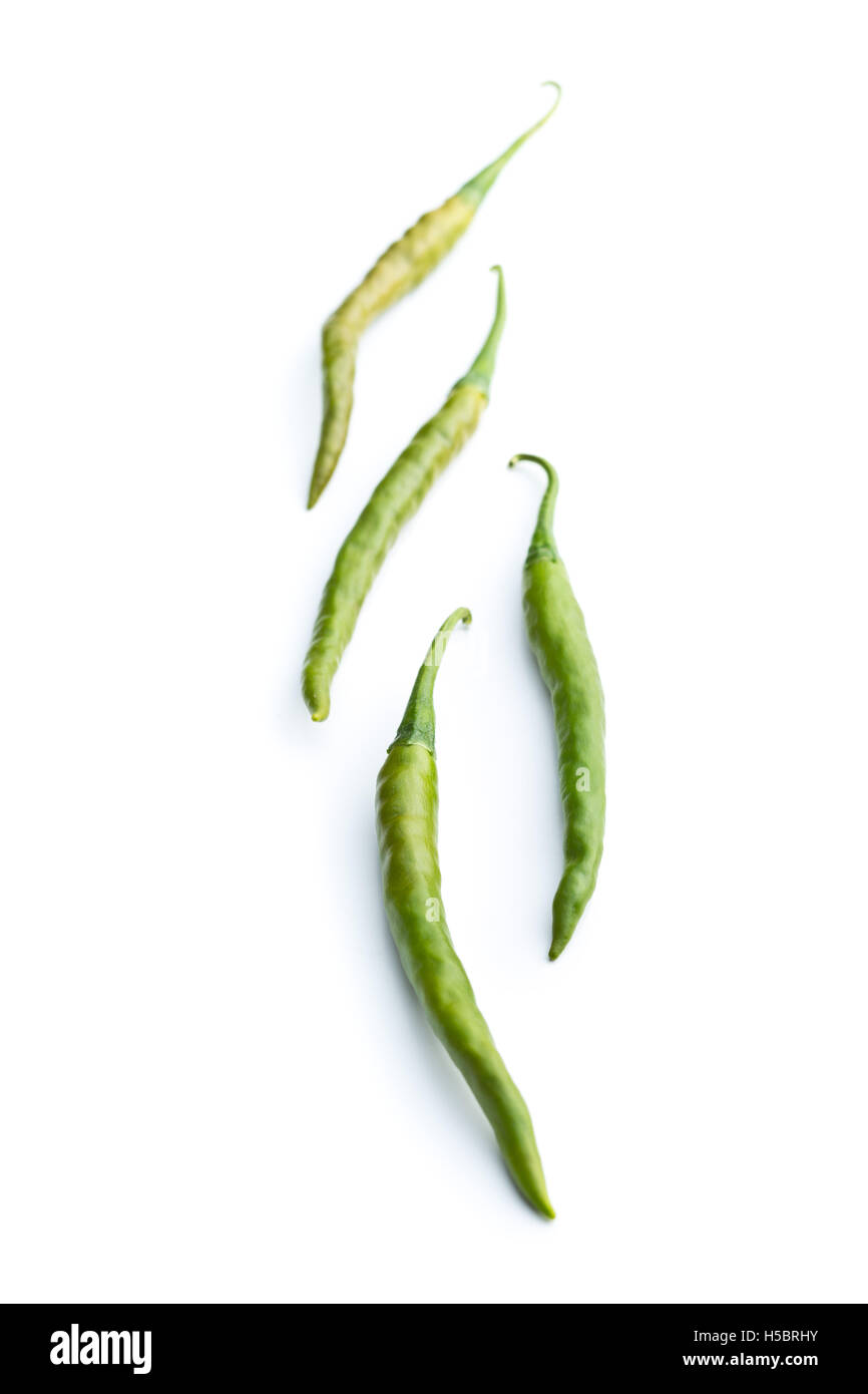 Green chili peppers isolated on white background Stock Photo - Alamy
