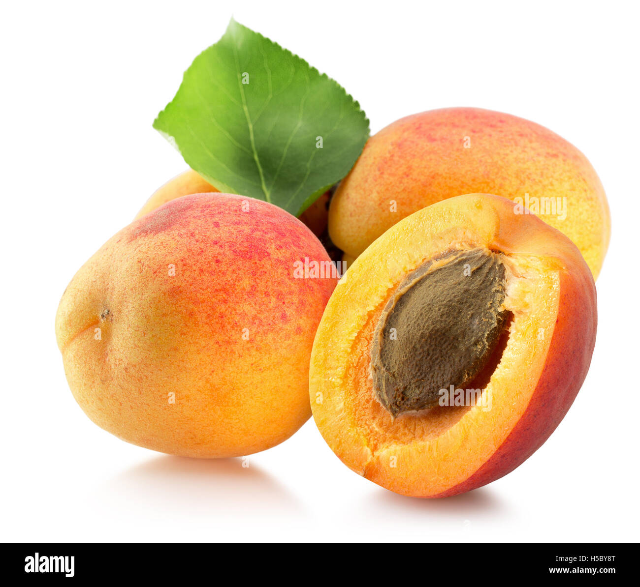 apricots isolated on the white background Stock Photo - Alamy