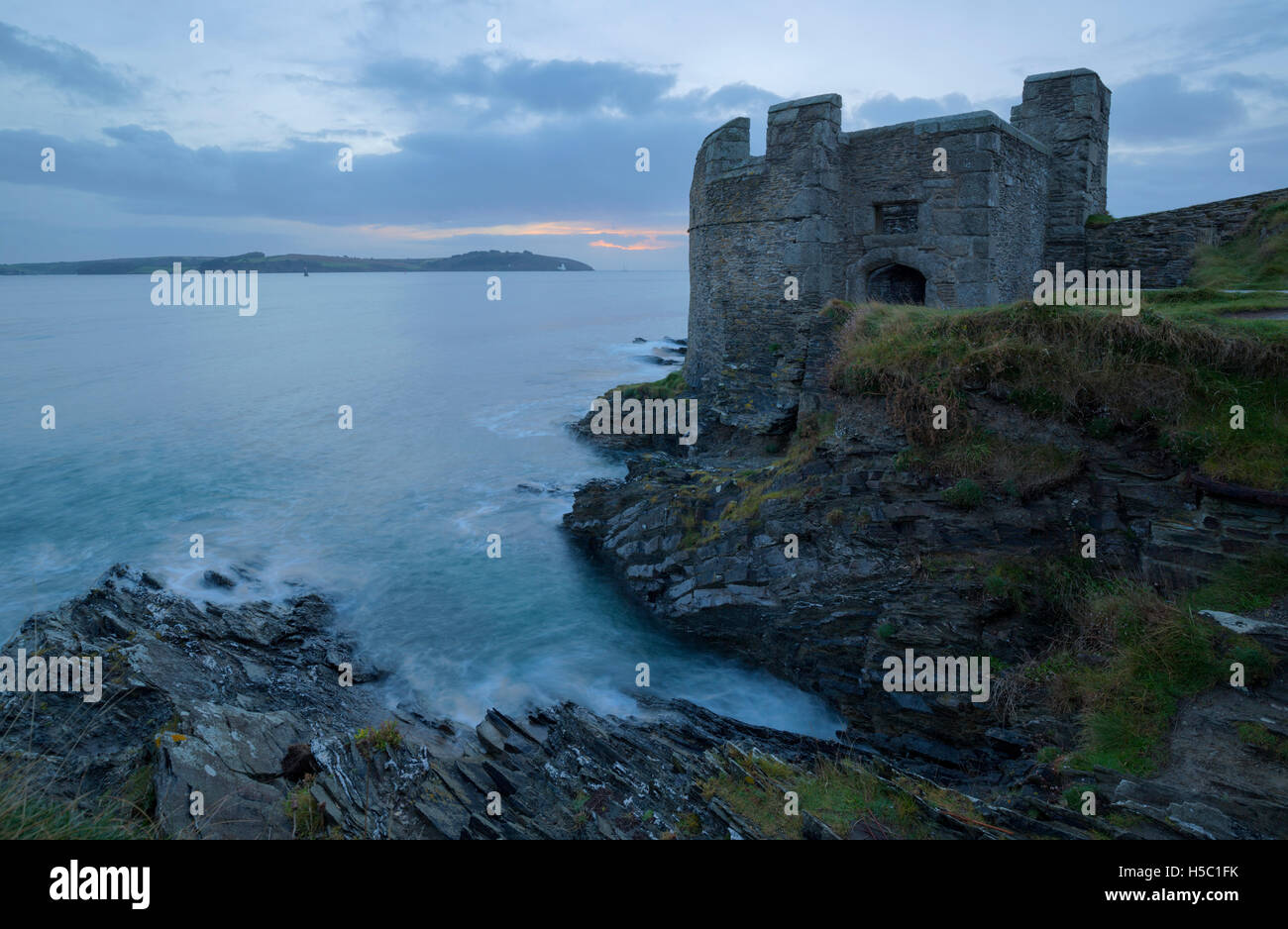 Dawn breaking over Pendennis Point in Cornwall Stock Photo
