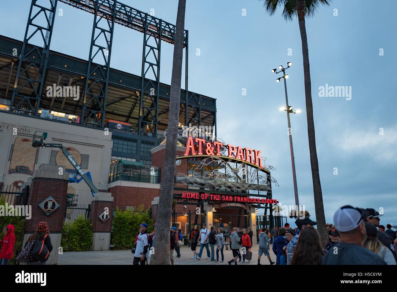 San Francisco, California, United States - August 21, 2016:  A crowd of people walking in front of a building at AT&T Park, San Stock Photo