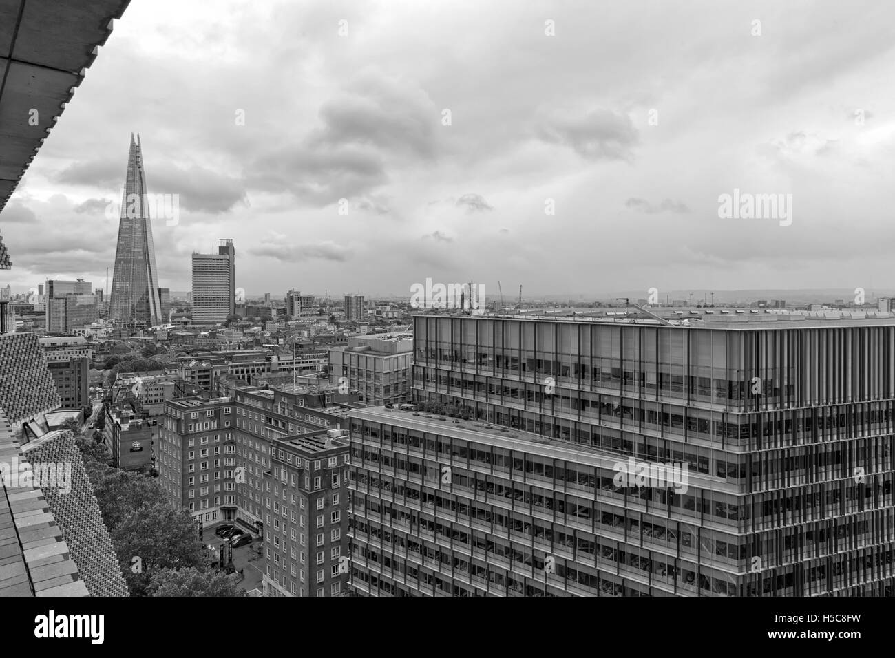 London, UK - July 2016: London and City of London panoramic view of the Shard from the Tate Modern Switch House roof observation Stock Photo