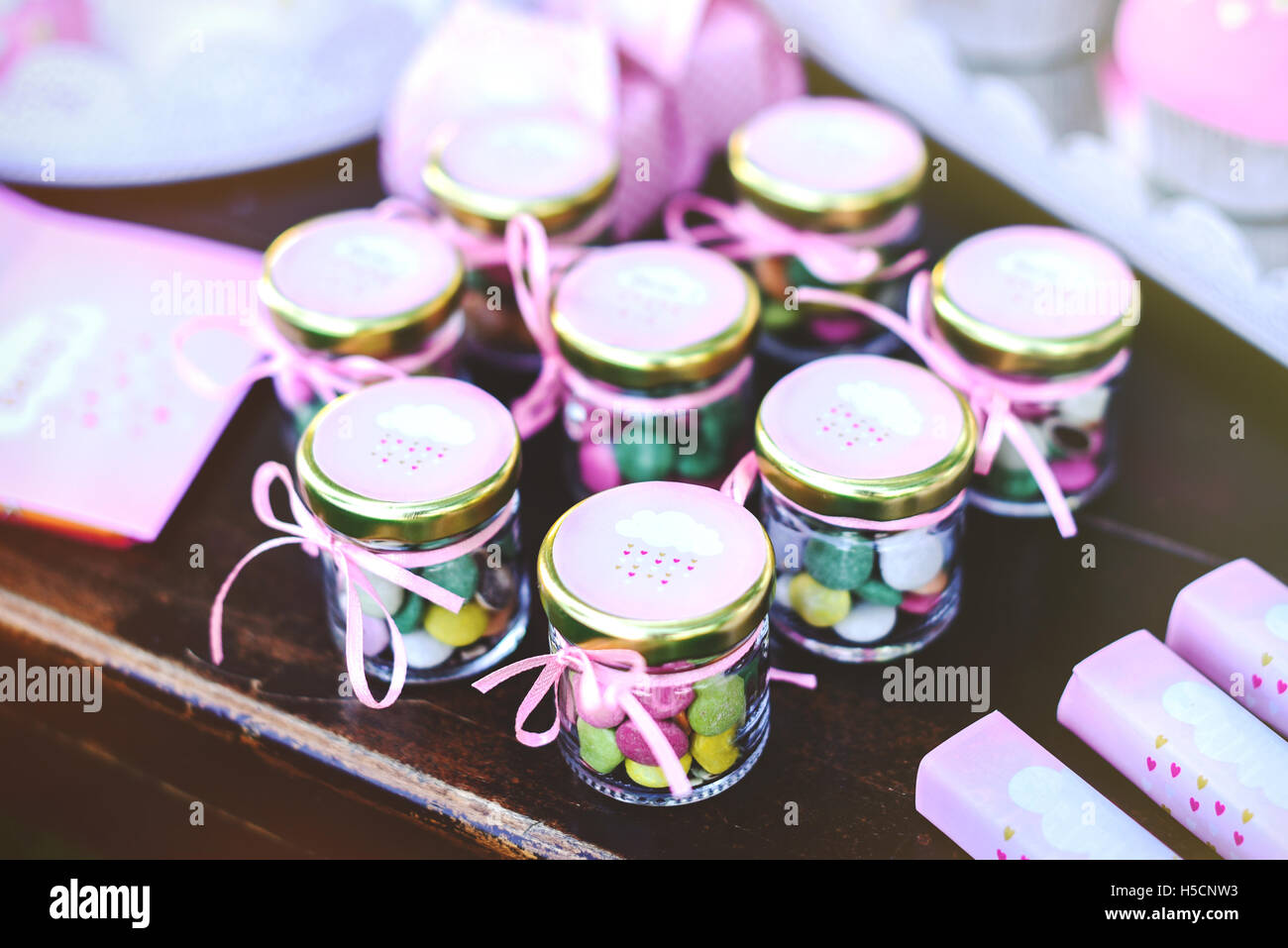 Dessert table at kids birthday party. Cake, candies, marshmallows
