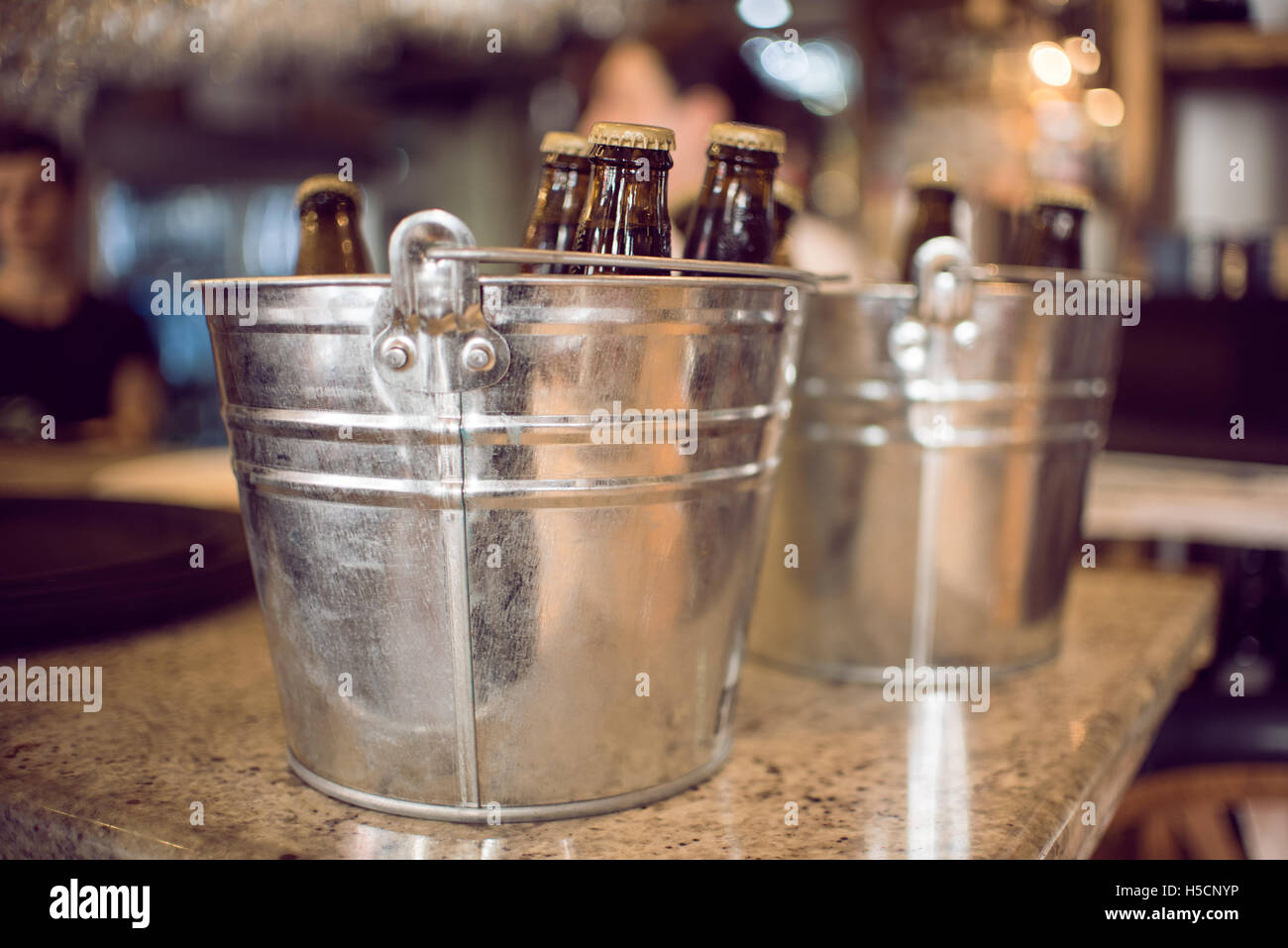 Beer bottles in ice bucket Stock Photo Alamy