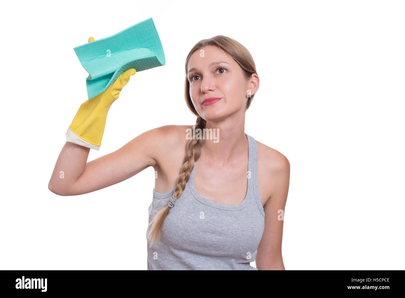 Young woman cleaning with rag, isolated on white background Stock Photo