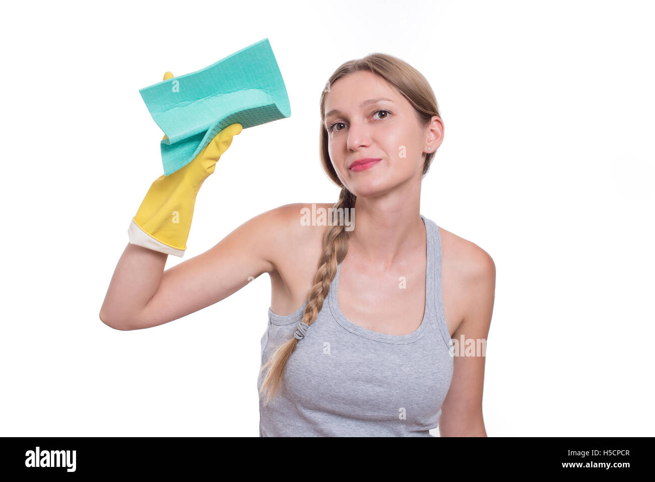 Young woman cleaning with rag, isolated on white background Stock Photo
