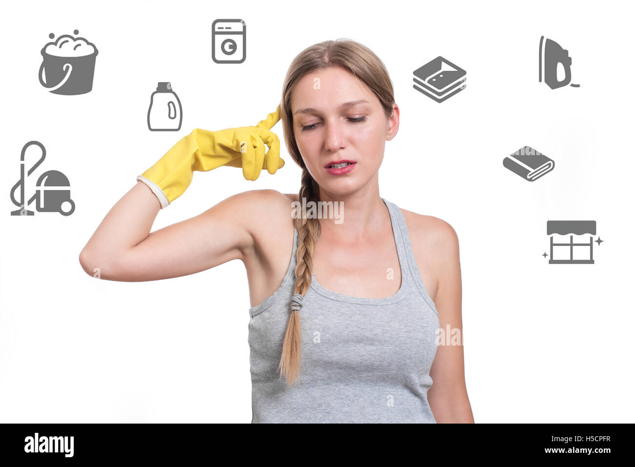 Tired, frustrated and exhausted cleaning woman with rubber gloves Stock Photo