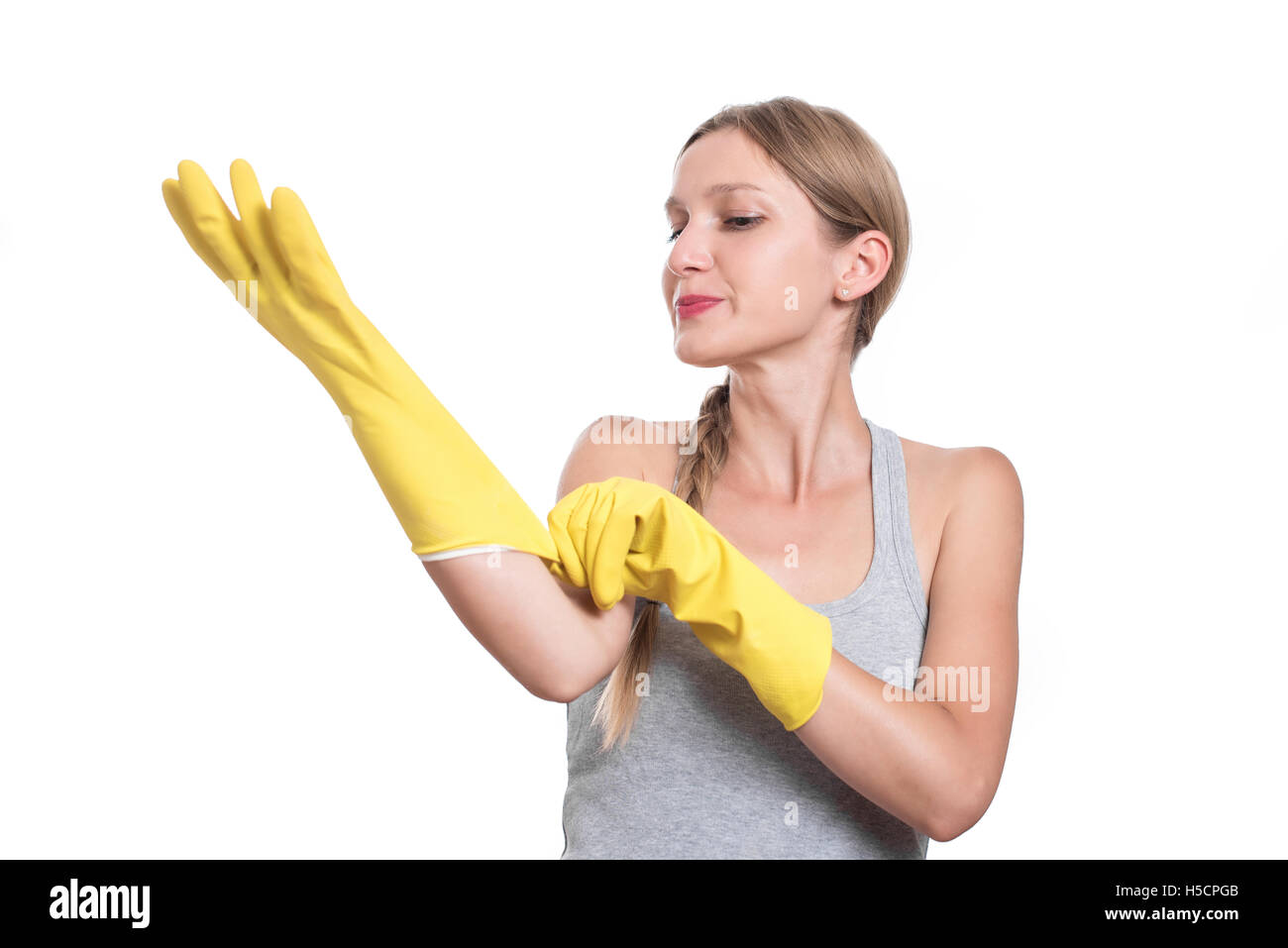 Woman ready for cleaning with rubber gloves and smiling Stock Photo - Alamy